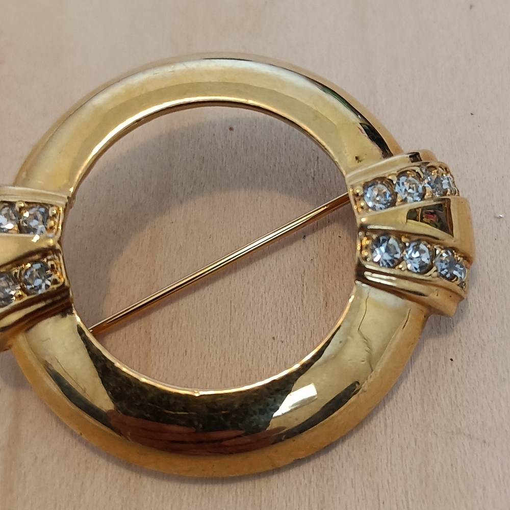 Avon Gold-Tone Circular Brooch with Clear Crystal Accents